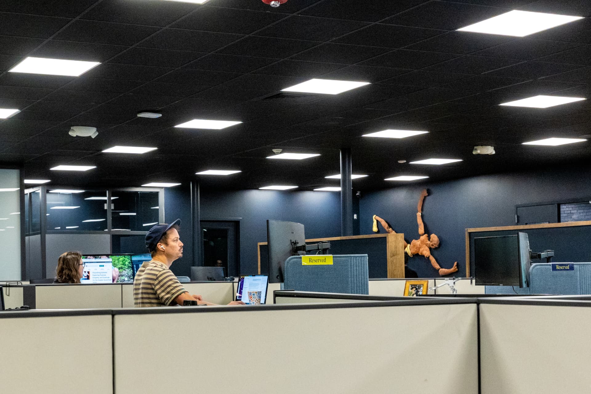Members working at their desks inside The Workspace at 7Acres